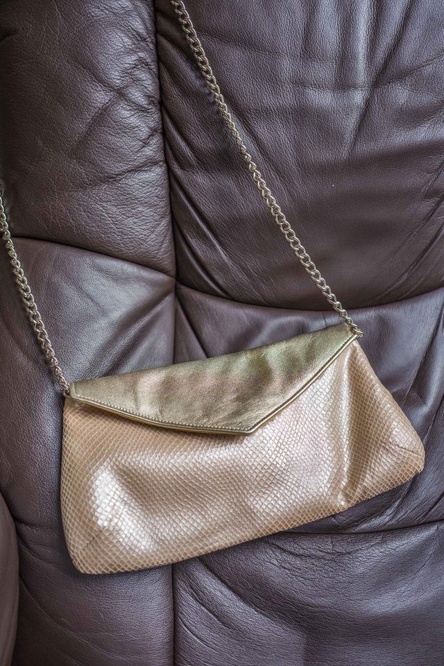 Preview of the first image of Champagne colour matching shoes and shoulder bag.