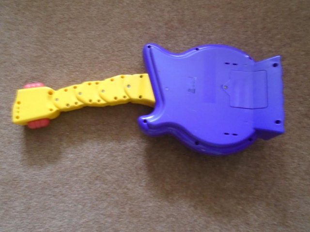 Preview of the first image of Wiggles Spin Master musical Guitar 2004.