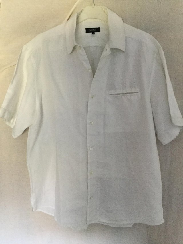 Preview of the first image of Beautiful whitelinen short sleeve shirt by Next.