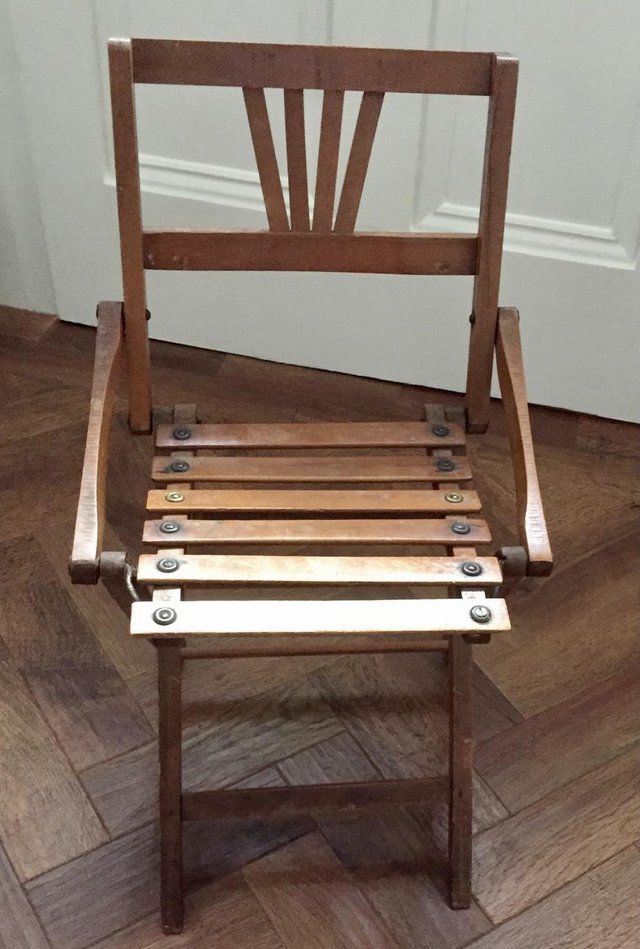 Preview of the first image of Old wooden child’s folding chair.