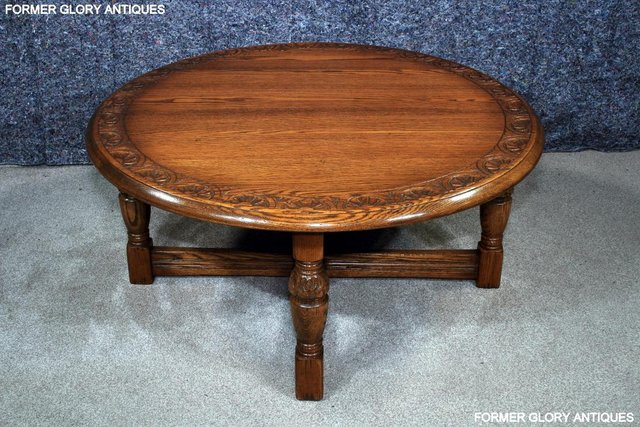 Image 2 of A LARGE ROUND JAYCEE AUTUMN GOLD CARVED OAK PUB COFFEE TABLE