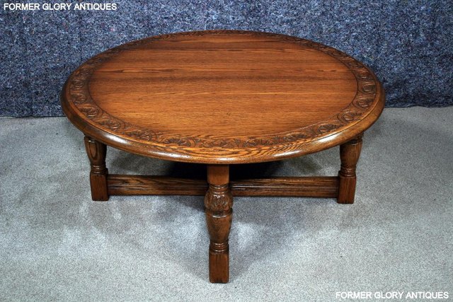Image 10 of A LARGE ROUND JAYCEE AUTUMN GOLD CARVED OAK PUB COFFEE TABLE