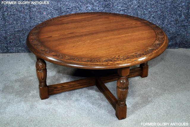 Image 14 of A LARGE ROUND JAYCEE AUTUMN GOLD CARVED OAK PUB COFFEE TABLE