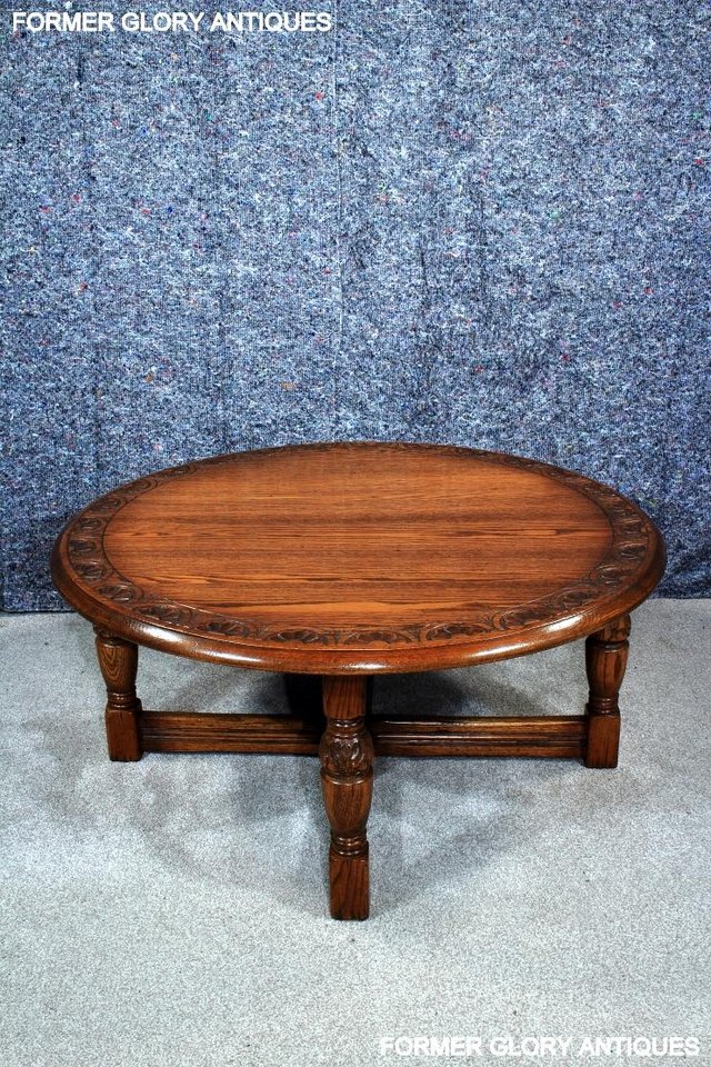 Image 18 of A LARGE ROUND JAYCEE AUTUMN GOLD CARVED OAK PUB COFFEE TABLE