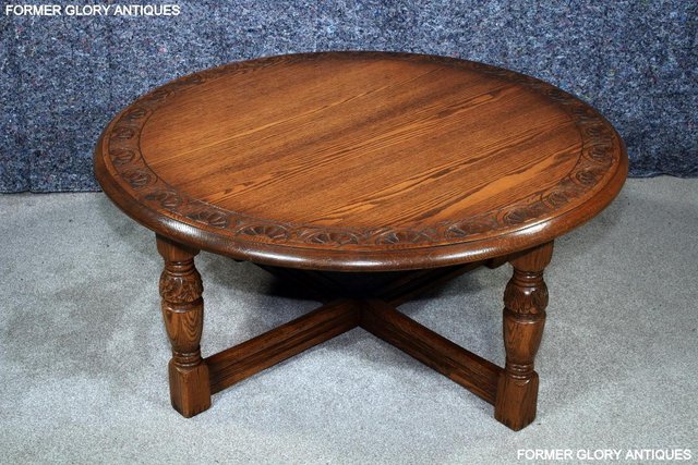 Image 22 of A LARGE ROUND JAYCEE AUTUMN GOLD CARVED OAK PUB COFFEE TABLE
