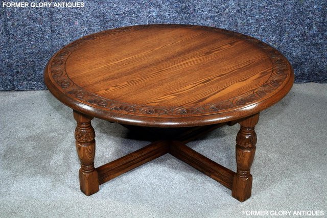 Image 29 of A LARGE ROUND JAYCEE AUTUMN GOLD CARVED OAK PUB COFFEE TABLE
