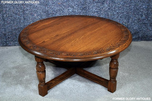 Image 34 of A LARGE ROUND JAYCEE AUTUMN GOLD CARVED OAK PUB COFFEE TABLE