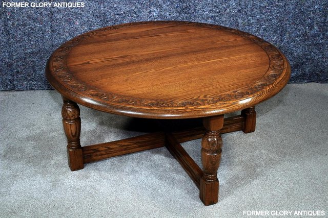 Image 35 of A LARGE ROUND JAYCEE AUTUMN GOLD CARVED OAK PUB COFFEE TABLE