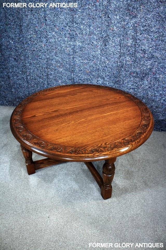 Image 36 of A LARGE ROUND JAYCEE AUTUMN GOLD CARVED OAK PUB COFFEE TABLE