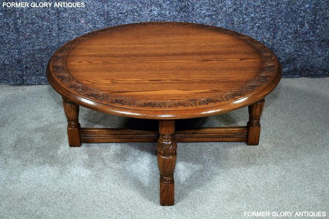 Image 39 of A LARGE ROUND JAYCEE AUTUMN GOLD CARVED OAK PUB COFFEE TABLE