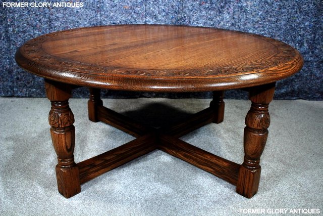 Image 44 of A LARGE ROUND JAYCEE AUTUMN GOLD CARVED OAK PUB COFFEE TABLE
