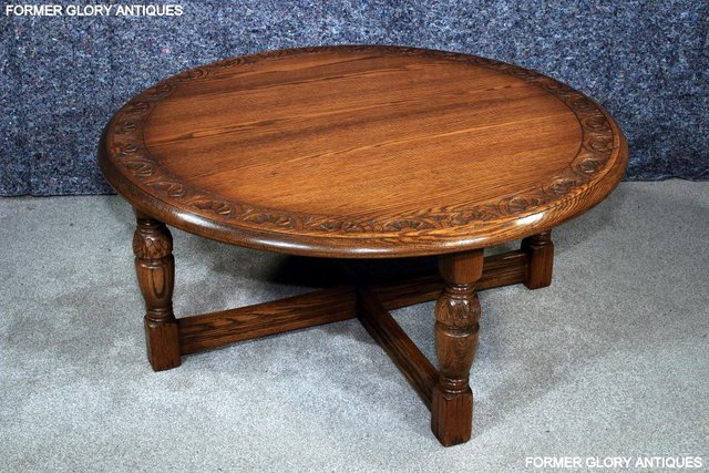 Image 47 of A LARGE ROUND JAYCEE AUTUMN GOLD CARVED OAK PUB COFFEE TABLE