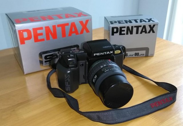 Preview of the first image of Pentax SFX SLR 35mm film Camera and Zoom lens.