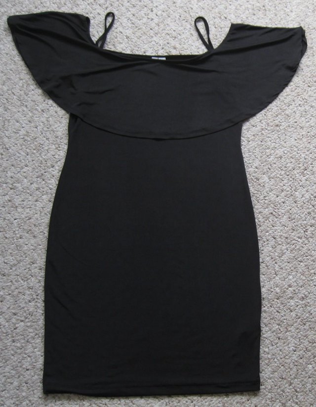 Preview of the first image of Black off the shoulder dress, size 10.