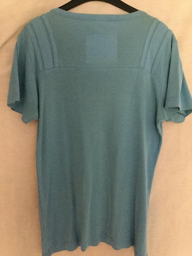 Preview of the first image of Blue designer G Star Raw tee shirt.