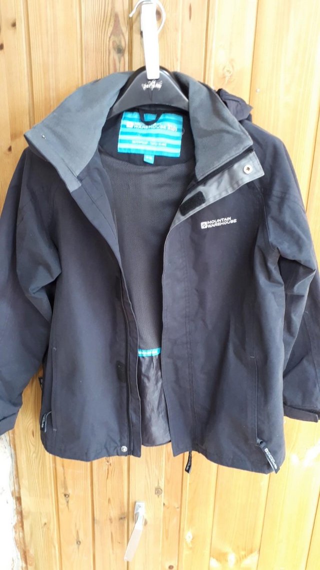 Preview of the first image of Age 9-10 Mountain Warehouse Fizz Waterproof lined coat EUC.