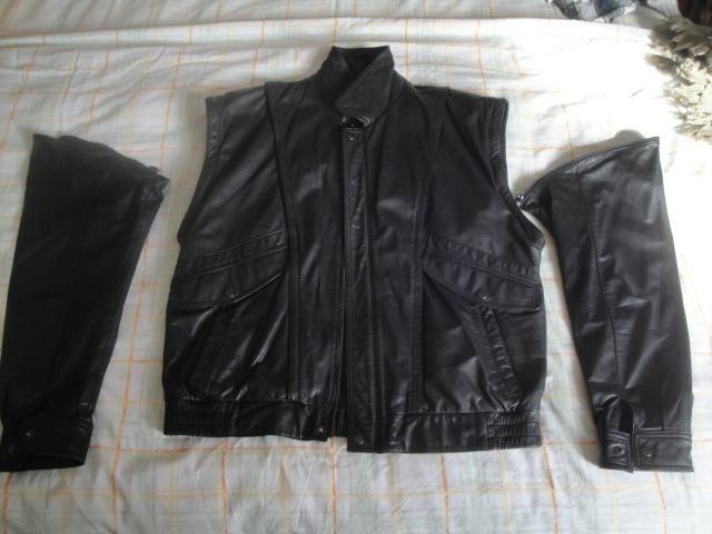 Preview of the first image of Black Leather Waistcoat /Jacket with Zip off sleeves.C424/10.