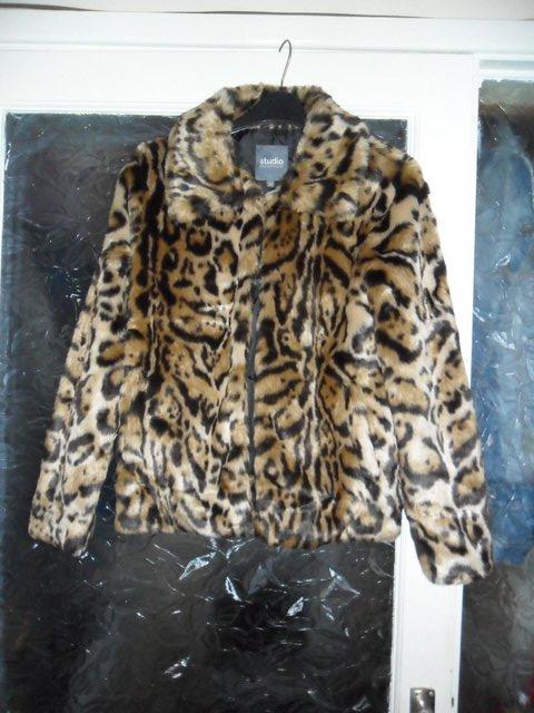 Preview of the first image of Ladies Brown Faux Fur Jacket Size 8.