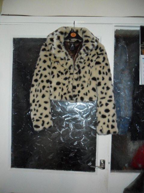Preview of the first image of LADIES SHORT FAUX FUR JACKET SZE 8..