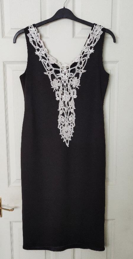 Preview of the first image of Stunning Ladies Black Bodycon Dress By John Zack - Size 14.