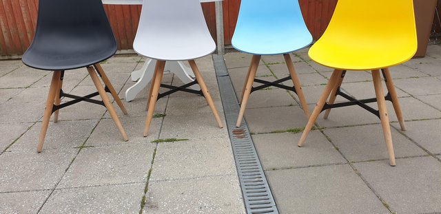Preview of the first image of Eames style colourful dining chairs x 4.