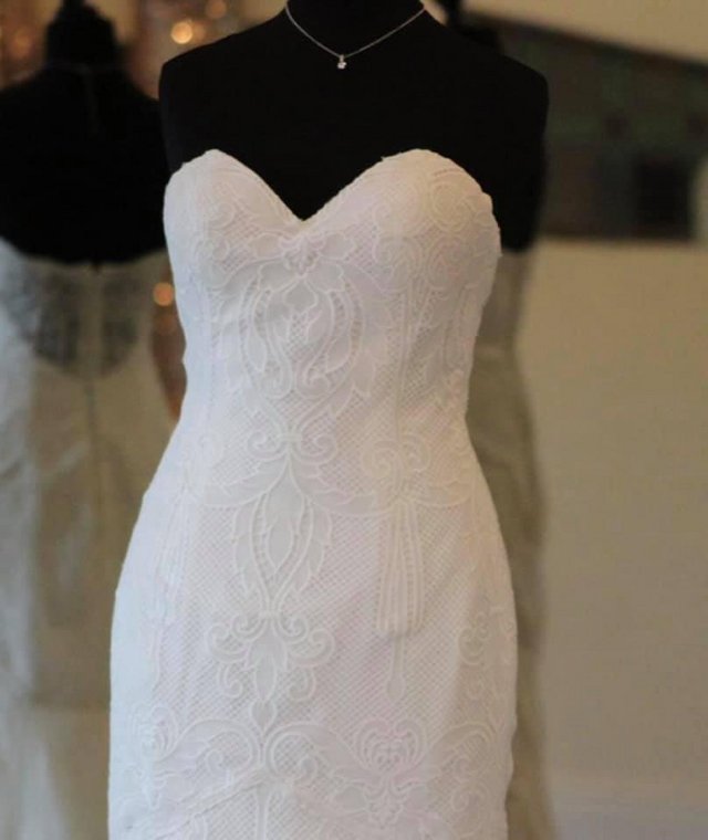 Preview of the first image of Size 6 White April Brand New Wedding Dress for sale.
