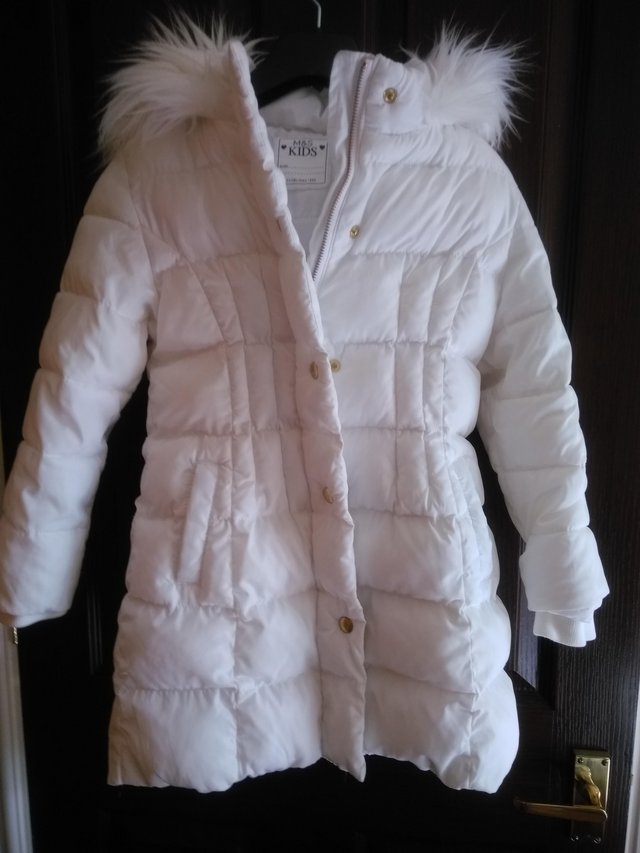 Preview of the first image of Girl's winter coat from M & S Age 5-6.
