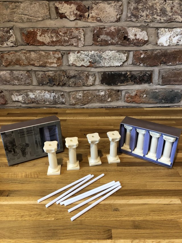 Image 2 of Ivory plaster cake pillars with plastic doweling rods
