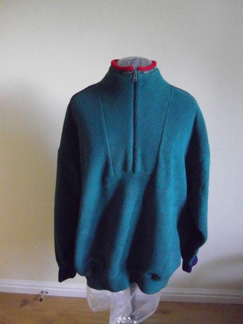 Preview of the first image of Polartec Large Fleece Jacket - Green/Blue.