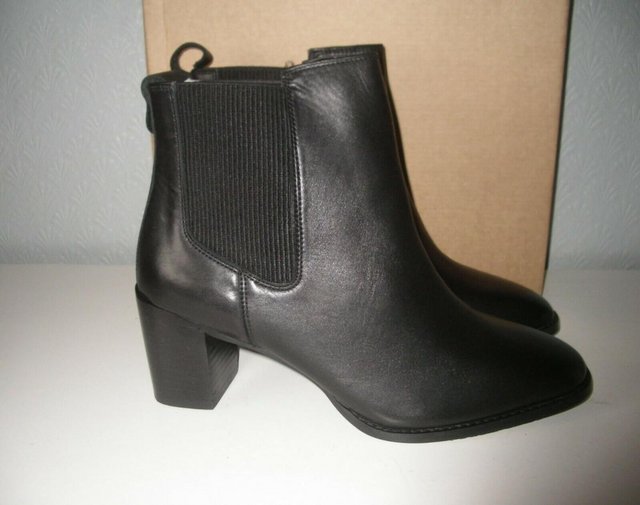 Preview of the first image of LEATHER HEELED CHELSEA BOOT - BLACK - U.K SIZE 7.