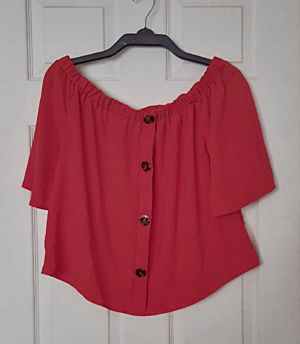 Preview of the first image of Pretty Ladies Red Short Sleeved Blouse - Size 14.