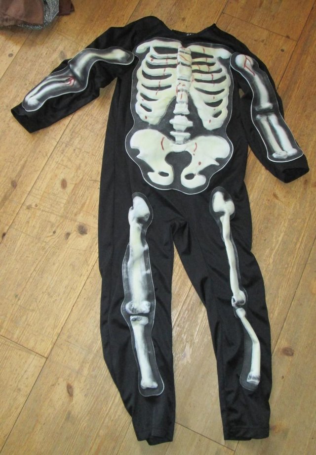 Preview of the first image of Halloween Skeleton Costume 5/6 years.