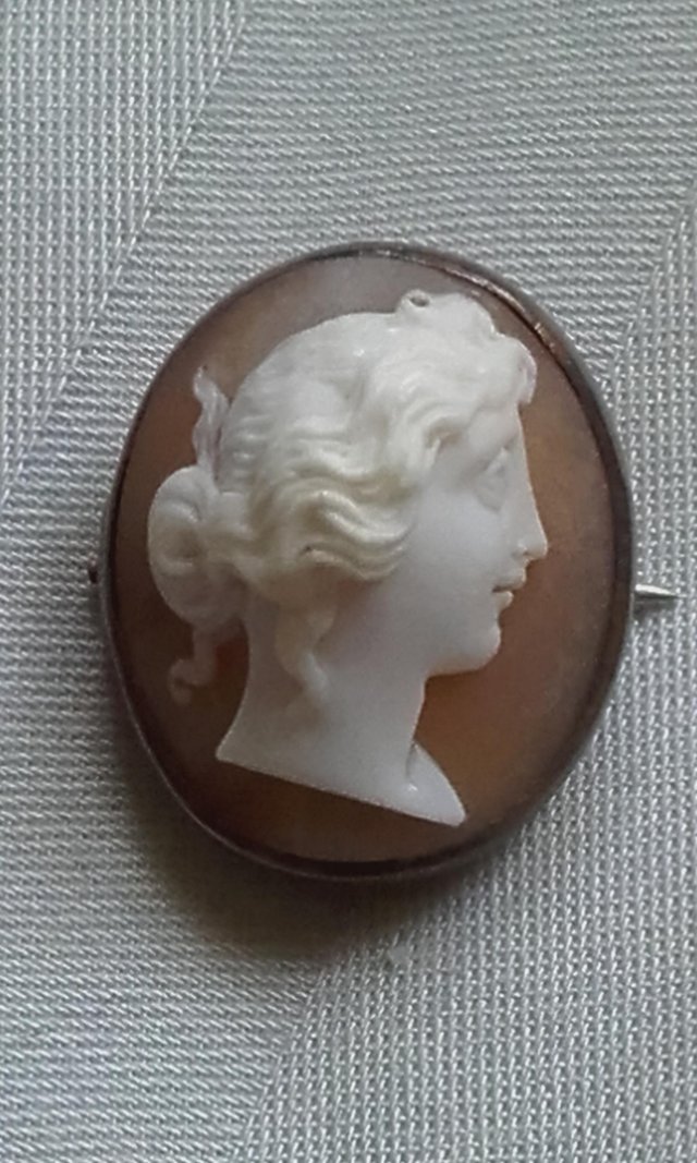 Preview of the first image of Antique Victorian White Metal Framed Carved Oval Shell Cameo.