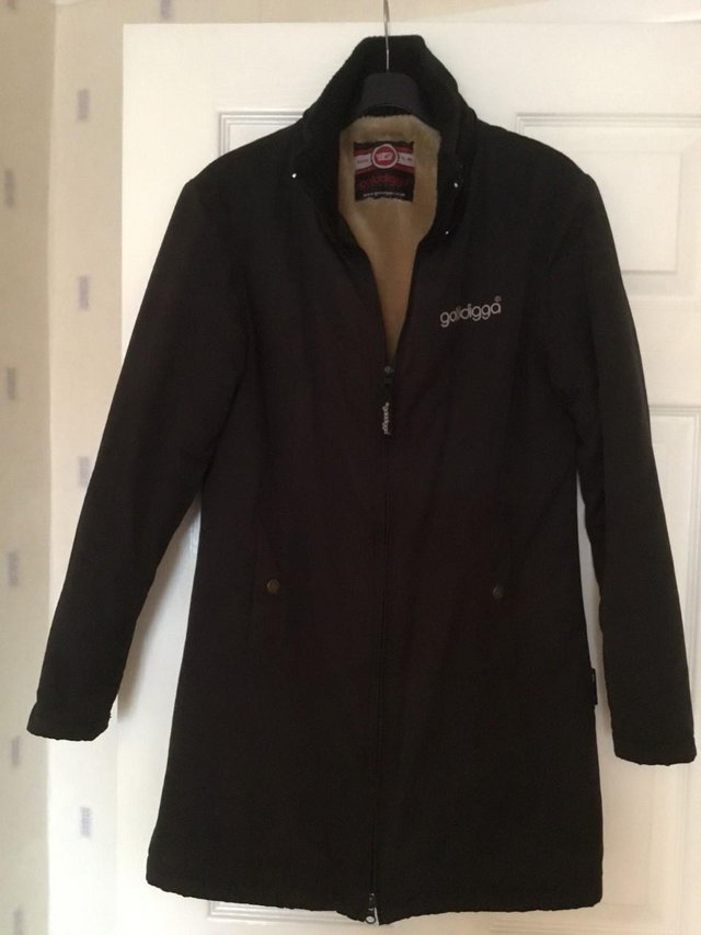 Preview of the first image of Golddigga black coat with zip fastening - small size.