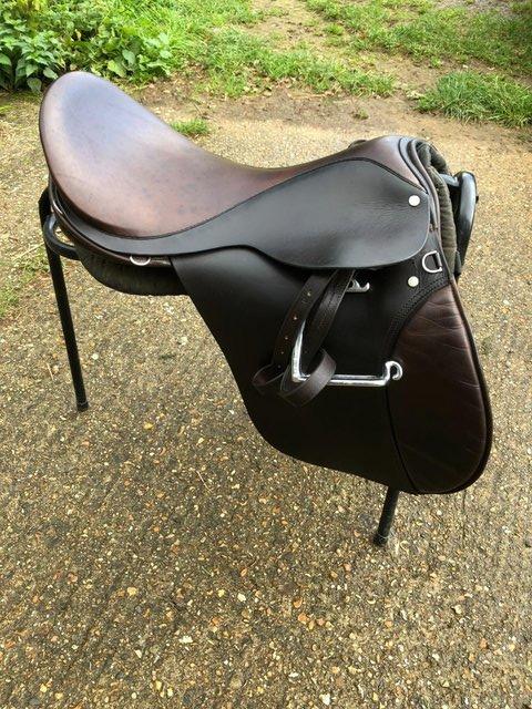 Preview of the first image of 19' Dark Brown and Burgundy Calcutt & Son's Saddle + Bridle.
