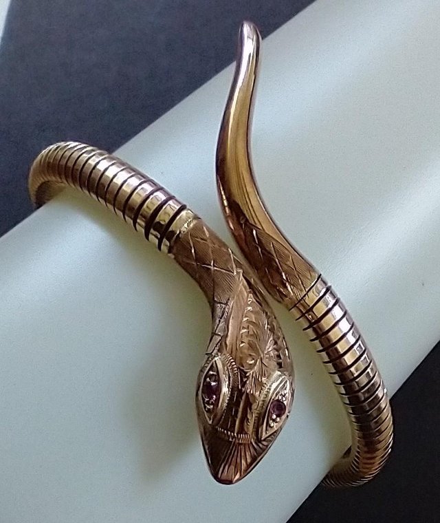 Preview of the first image of STUNNING & UNUSUAL GOLD SNAKE BANGLE.