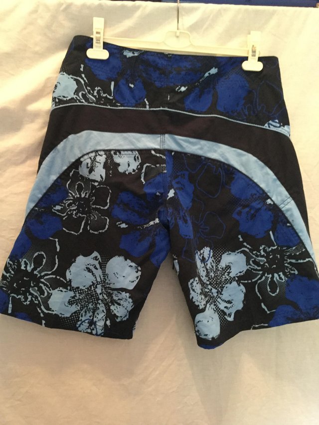 Image 2 of Brightly patterned board shorts