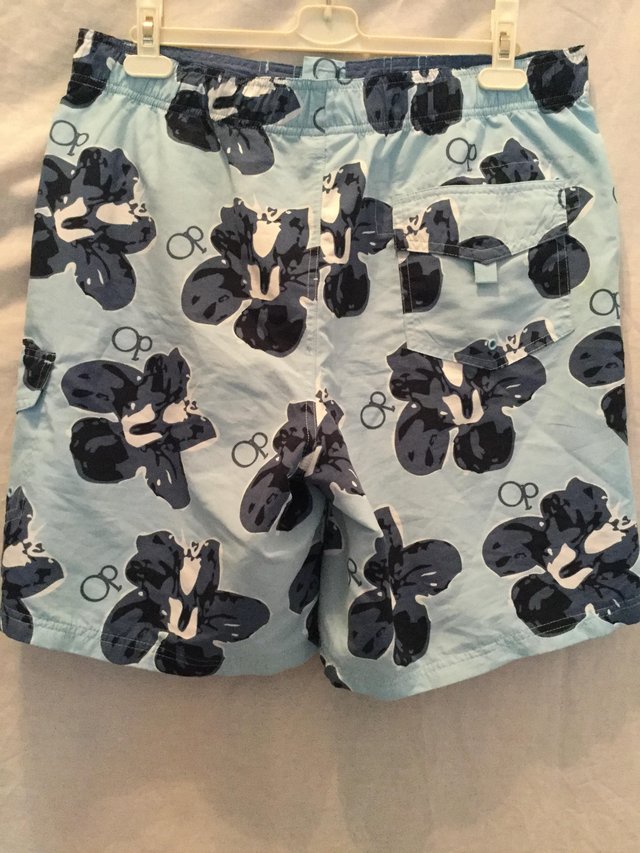 Image 2 of Brightly patterned board shorts