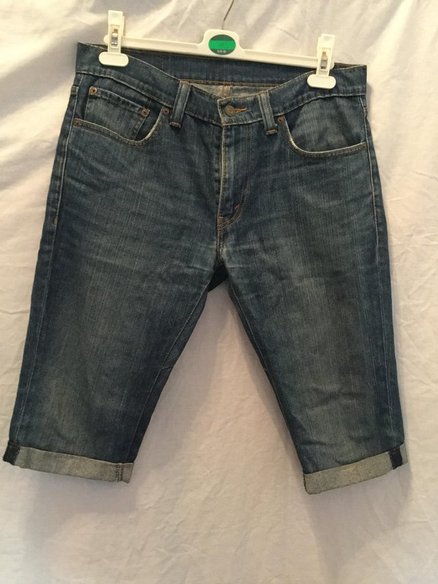 Preview of the first image of Excellent Levi denim 3/4 shorts.