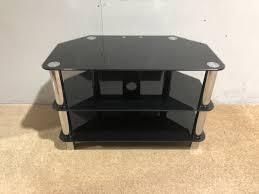 Preview of the first image of Black Glass T.V. Stand For Sale.