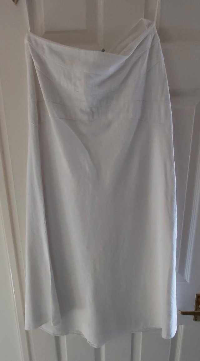 Preview of the first image of White Linen-Mix Maxi Skirt with Stitch Detail..