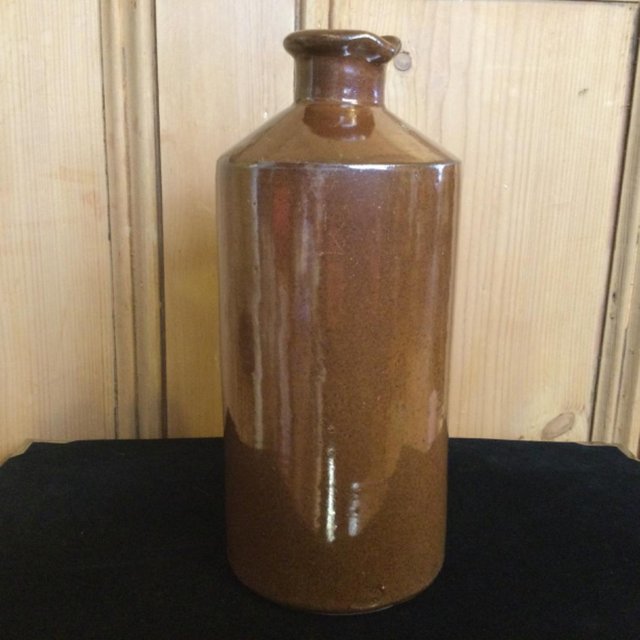 Preview of the first image of Large 9 1/2” MOIRA Pottery Stoneware Lipped Bottle.