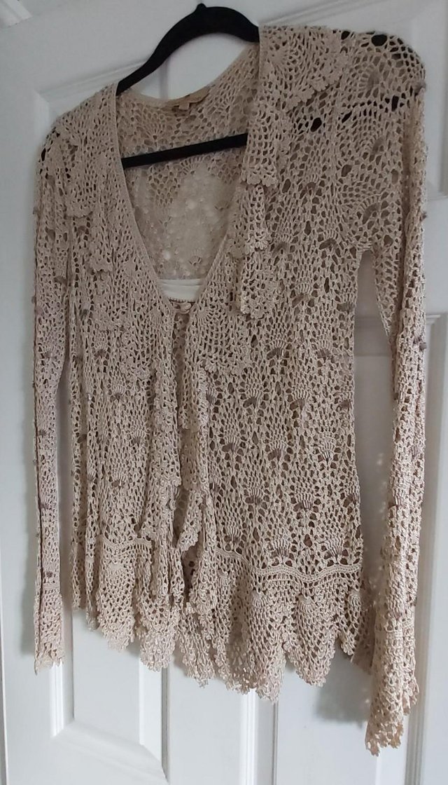 Preview of the first image of Gold Crocheted Vest Top & Cardigan with Bead Detail..