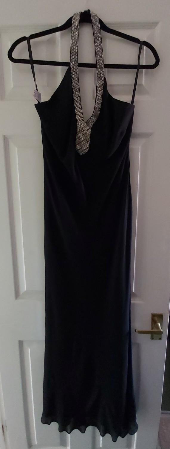 Preview of the first image of Black Full-length Silk Evening Dress with Beaded Halter-neck.