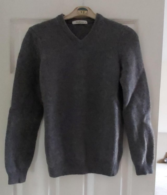 Preview of the first image of Charcoal Lambswool V-neck Jumper..
