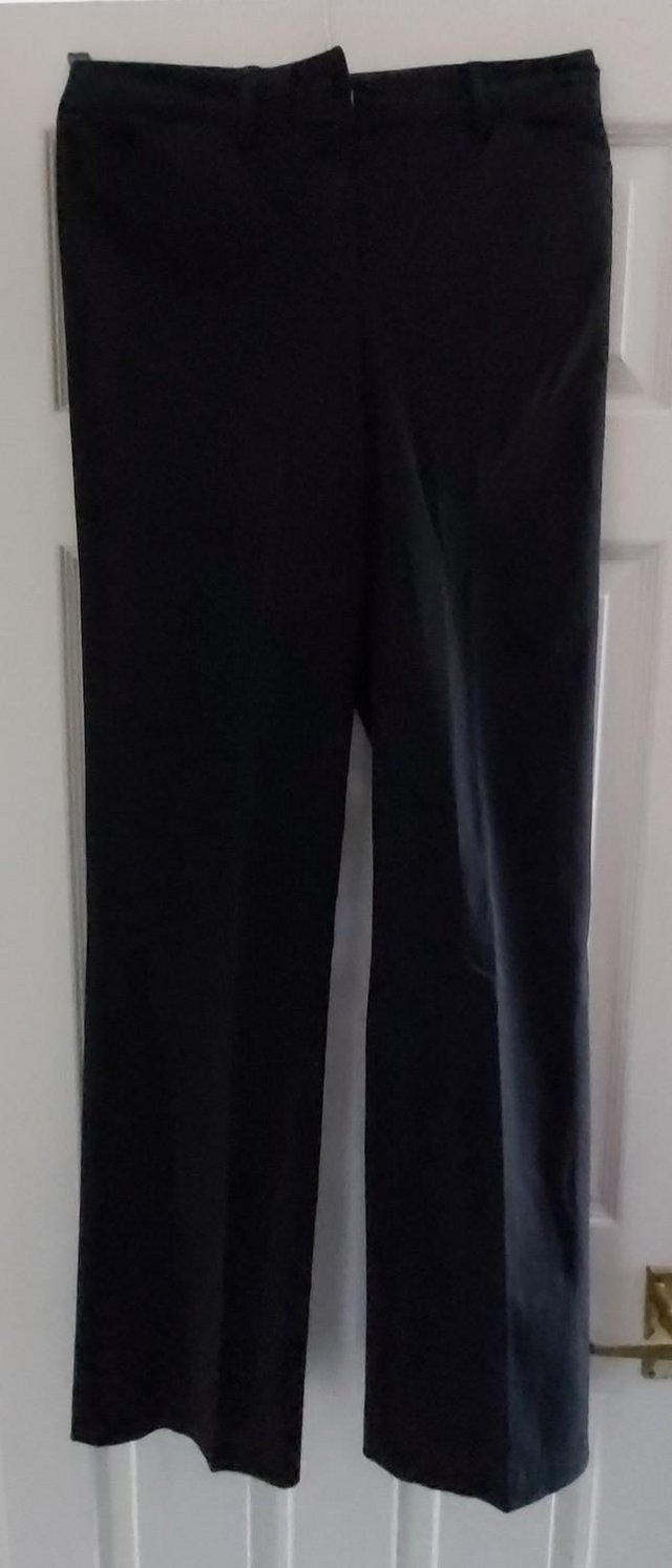 Preview of the first image of Massimo Dutti Ladies Straight Leg Black Trousers..