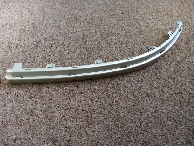 Preview of the first image of Volvo S60 Facelift Front Bumper Trim Part No. 08693645 LH.