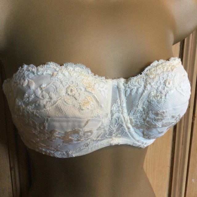 Preview of the first image of 36B M&S Padded Strapless Lace Boned Balcony Bra, Cream.