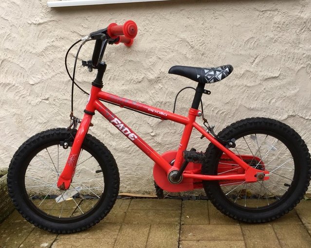 Preview of the first image of Unisex (Halfords)red child’s bicycle.