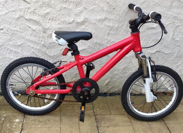 Preview of the first image of Boy or girl’s painted red bicycle.